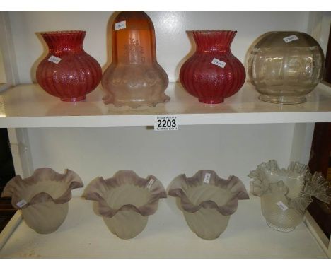 8 glass lamp shades.