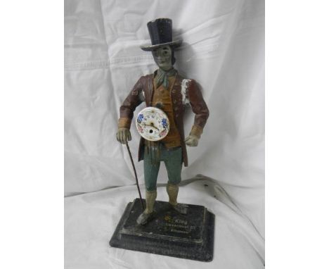 A Spelter figure clock seller clock.