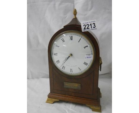 A Comitti of London mantel clock.