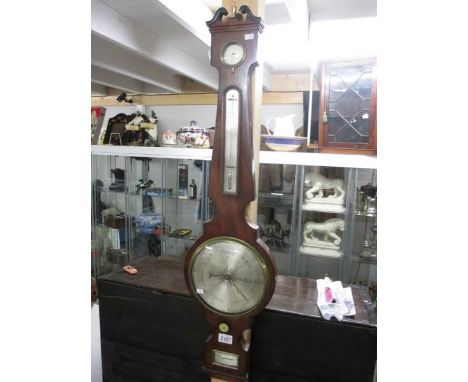 A Victorian barometer in good condition.