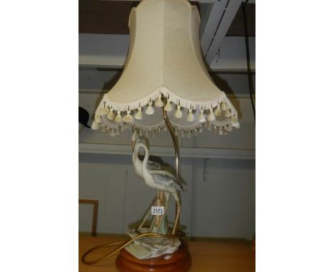 A good quality mid - late 20th century Capodimonte table lamp being figures of storks, 31" tall a/f ****Condition report**** 