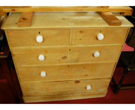 A Victorian pine round cornered chest of two short over three long drawers, having white ceramic handles, w.104cm
