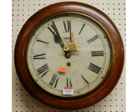 A Victorian mahogany circular school clock, having white painted 10" dial and winding key