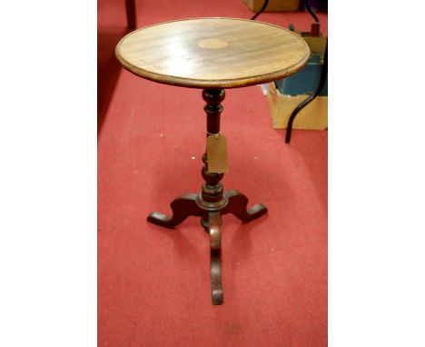 A 19th century mahogany circular fixed top pedestal tripod occasional table