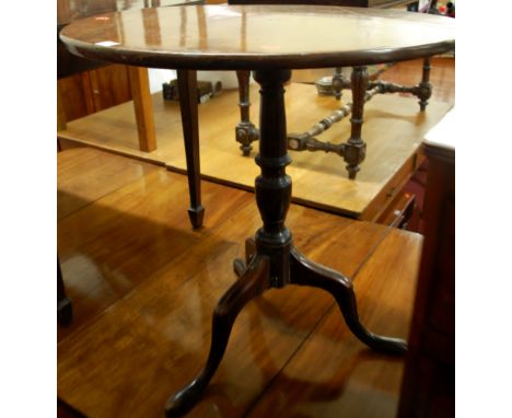 A George III mahogany circular pedestal tripod table, dia. 71.5cm