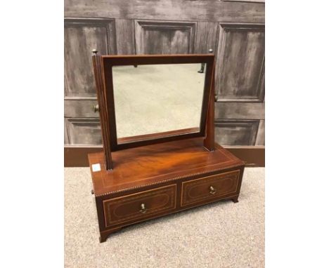 EDWARDIAN MAHOGANY 'SHERATON REVIVAL' DRESSING GLASSthe square swing glass on box base with two frieze drawers, on ogee brack