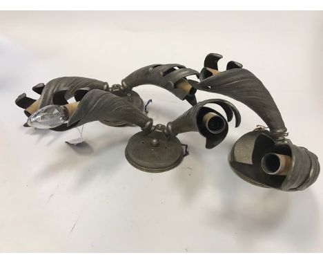 THREE SILVERISED STEEL WALL SCONCES OF ART DECO DESIGNeach with two cornucopia shaped shades, approximately 32cm wide extende