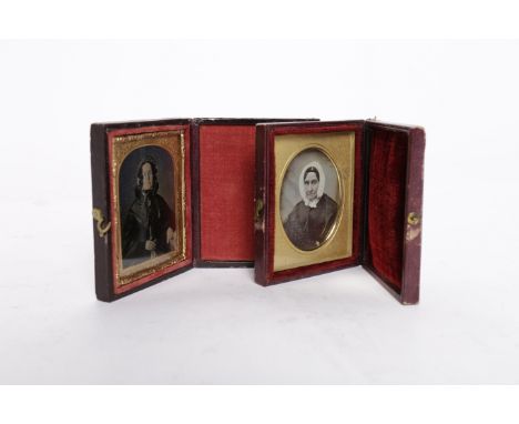 VICTORIAN AMBROTYPE PORTRAIT of a woman dressed in cap contained in portrait oval, hand-coloured, contained in leather case, 