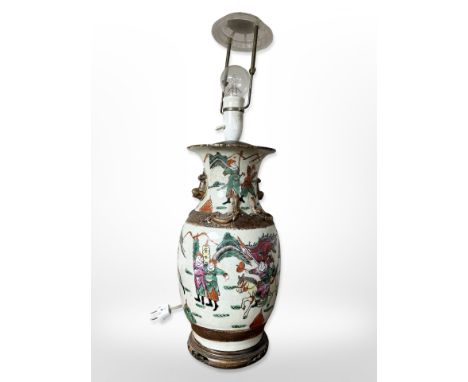 An early 20th century Chinese earthenware baluster vase converted to a table lamp (Continental plug), overall height 58 cm