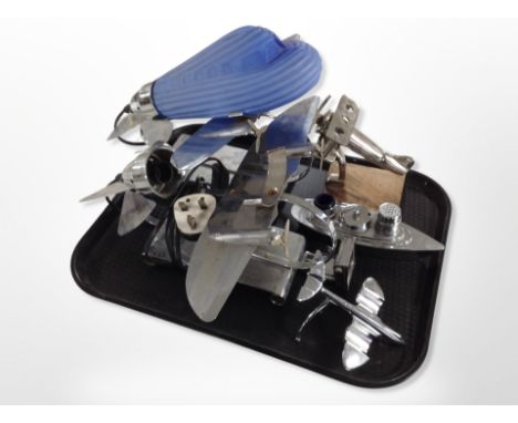 A group of chrome desktop items including aeroplane lamp, further lamp with blue glass shade, condiment set in the form of a 
