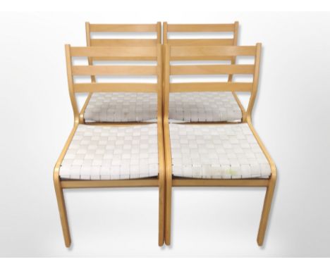 Four Danish beech ladder back dining chairs with canvas webbed seats 