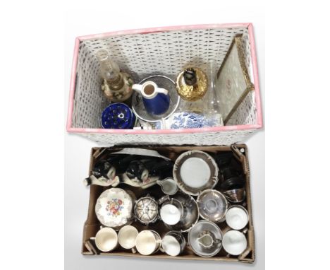 A box and wicker basket containing oil lamp bases, Maling vase, blue and white lamp base, pair of teapots in the form of cats