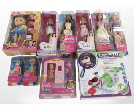 A box of Mattel Barbie dolls and a Teksta Micro Pets figure, boxed 
