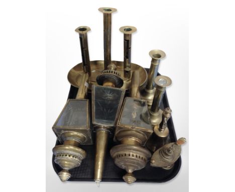 A group of brass to include triple sconce ejector candlestick, carriage lanterns, further pair of ejector candlelsticks etc 