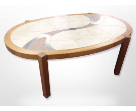 A Danish Haslev teak and tile inset oval coffee table, width 140 cm x 88 cm deep x 50 cm high 