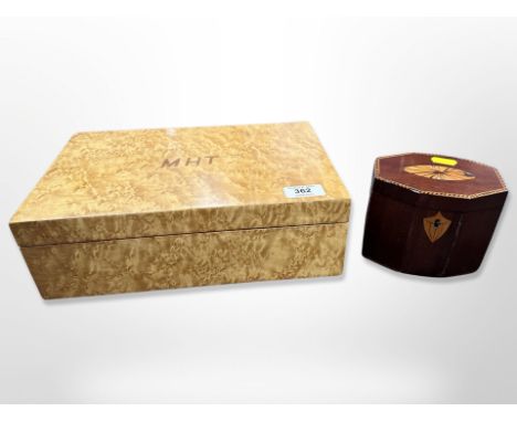 A George III octagonal mahogany and satinwood inlaid tea caddy with foil lining together with a contemporary birdseye maple-v