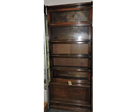 An early 20th Century Globe Wernike style glazed oak six section bookcase, W. 86cm (to be sold with three further damaged sec