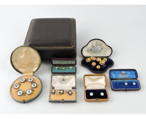An early 20th century  yellow gold cufflink and stud set, a pair of 18ct diamond and enamel studs, three blue enamel and spli