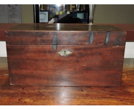 A late Georgian rectangular mahogany tea caddy with cast cornucopia ring handles.