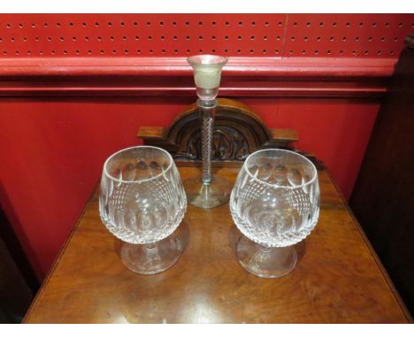 A pair of Waterford crystal Colleen pattern brandy glasses together with a glass candle holder with swirl design stem, (20cm 