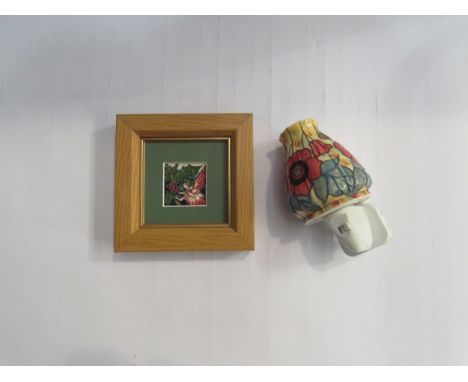 A Moorcroft plaque, marks to back and a Moorcroft light 5cm x 4cm and 10cm 
