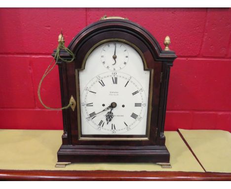 An 18th Century mahogany cased twin fusee striking bracket clock with verge escapement, painted arched dial, with Roman chapt