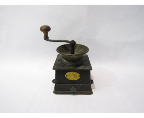 An Edwardian Kendrick &amp; Son's cast metal coffee grinder 