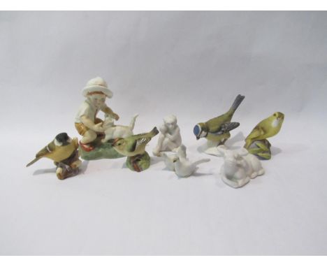 Eight assorted china figures including Royal Worcester "Snowy" and birds, some a/f 