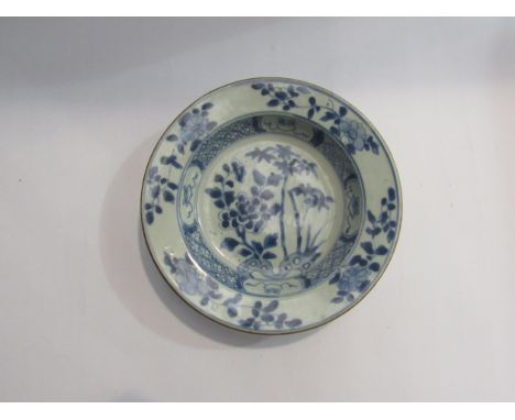 A Chinese blue and white dish with floral design, possibly Kangxi period, restored, 17cm diameter 