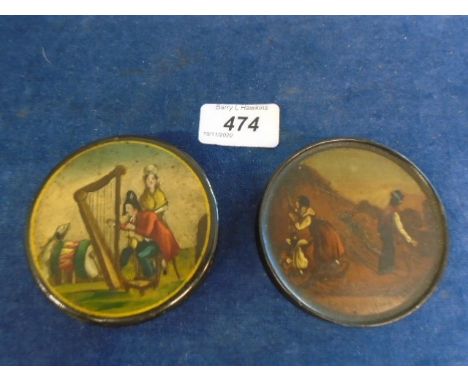 2 antique circular papier mache snuff boxes, one featuring a rural scene with the caption  'Le bon vieillard' approx 7.5cm di