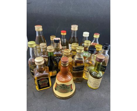 A collection of scotch whisky miniatures to include: The Buchanan Blend; Paddy old Irish Whisky; Grants; Johnnie Walker red l