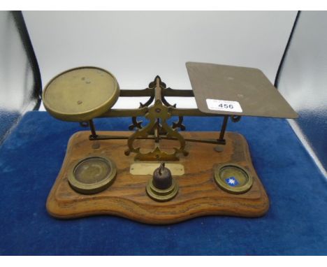 Postal scales marked "Inland letter rates" with graduated weights