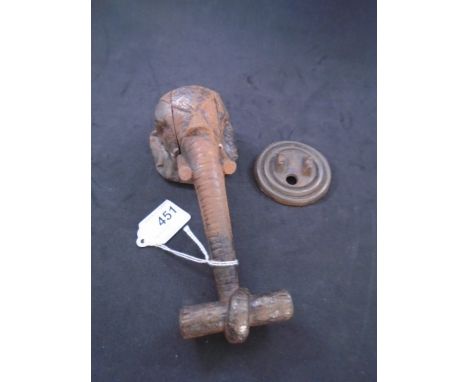 Cast door knocker in the shape of an elephants head, approx 19cm long