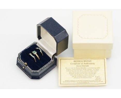 Brooks and Bentley trio of 9ct gold, emerald and diamond rings. The lot to include a ring set with a rectangular cut emerald 