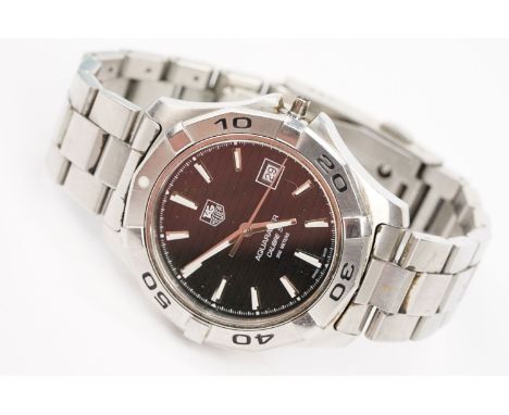 Tag Heuer Aquaracer calibre 5 wrist watch. The watch having a black face with baton markings to the chapter ring with date ap