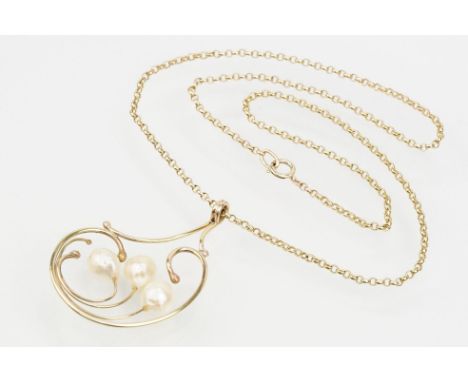 9ct gold and cultured pearl pendant necklace having a large scrolled pendant set with three pearls mounted to an oval link ch