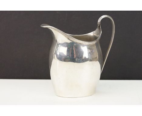 Late 19th Century Victorian silver hallmarked creamer jug of helmet form. Hallmarked Chester 1897. Measures 10cm tall. 