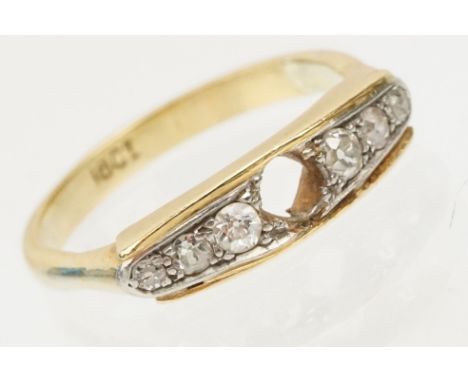 18ct gold and diamond ring. The ring being set with six round old cut diamonds with central stone missing. Marked 18ct to the