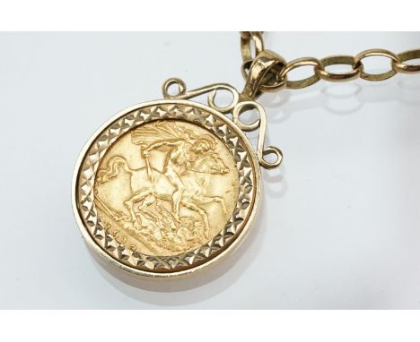 1913 half sovereign coin pendant set within a 9ct gold mount on a 9ct spectacle chain. Mount hallmarked 1993, chain marked 9k