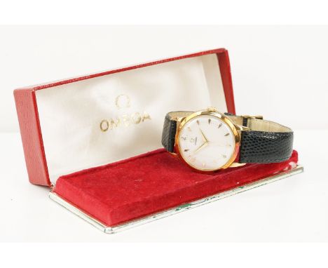 Omega 14ct gold cased wrist watch having a round face with diamond shaped hour markers set to a black leather strap. Circa 19
