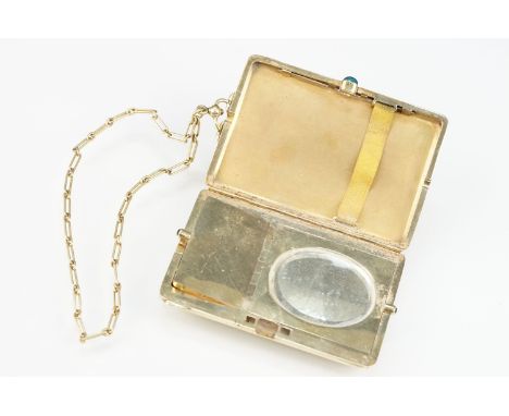Mid 20th Century 14ct gold ladies compact having an engine turned exterior with floral border and sapphire set buttons openin