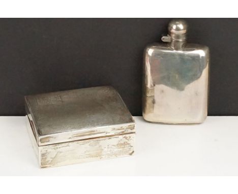 Silver whisky flask together with a silver hallmarked cigarette box. Whisky flask of plain form with twist lid to top (hallma