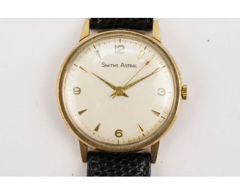 9ct gold case Smiths Astral wristwatch having a round face with triangular markings to chapter ring and faceted hands. Inner 