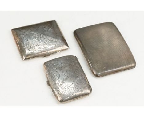Three silver hallmarked cigarette cases to include an engine turned cigarette case (hallmarked Birmingham 1929), case with en
