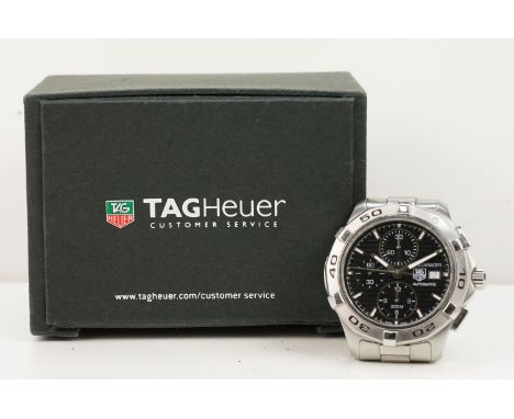 Tag Heuer Aquaracer automatic wristwatch. The watch having a round black face with silver baton markers to the chapter ring, 