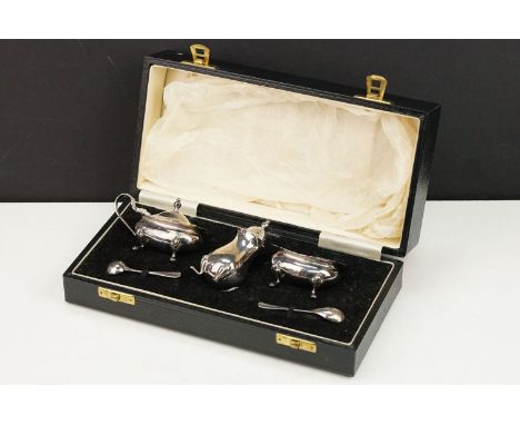 Silver cruet set consisting of mustard pot, table salt and pepper pot. Hallmarked London 1972, A Chick &amp; Sons. In fitted 