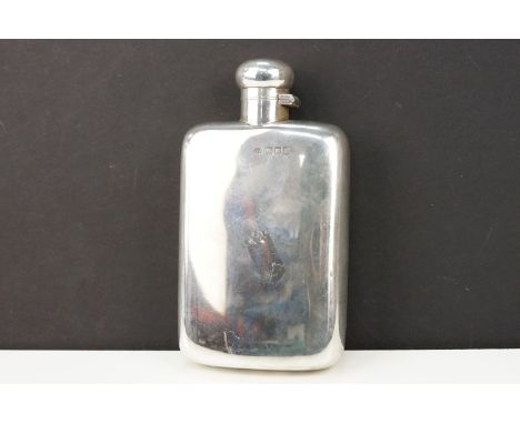 Early 20th Century silver hallmarked whisky flask of plain design with hinged lid to top. Hallmarked London 1902. Measures 15