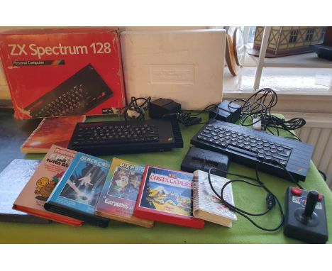 Pair of Vintage ZX Spectrum Computer consoles (incl 128K) , accessories and small quantity of games