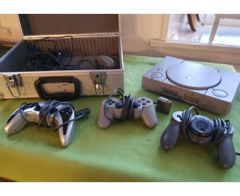 Sony Playstation Video Game Console with accessories and three handsets