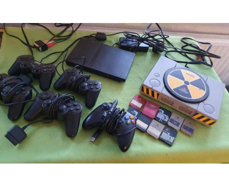 Sony Playstation and Playstation 2 game consoles with accessories, handsets and memory cards